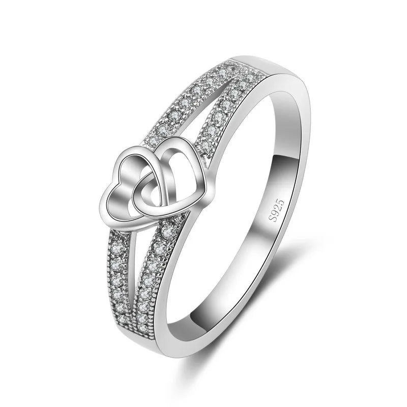 Interlocked Hearts Ring, 925 Silver. Pavé set