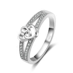 Interlocked Hearts Ring, 925 Silver. Pavé set