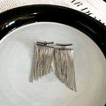 Fashion earrings with tassels